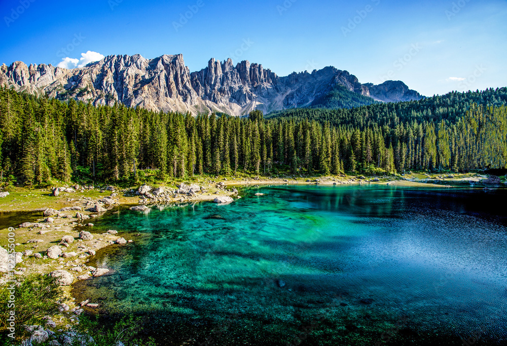Naklejka premium Karersee, Carezza lake, is a lake in the Dolomites in South Tyrol, Italy.