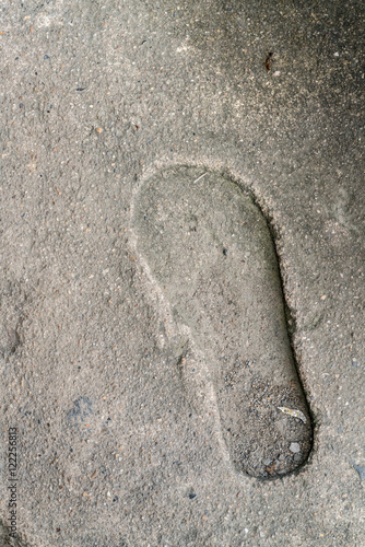 human footprint on concrete floor