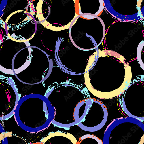 Seamless pattern with grunge colourful circles and splash on bla
