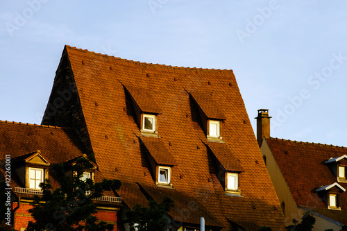 Red tile roofs of old buildings in historical center of Strasbou photo