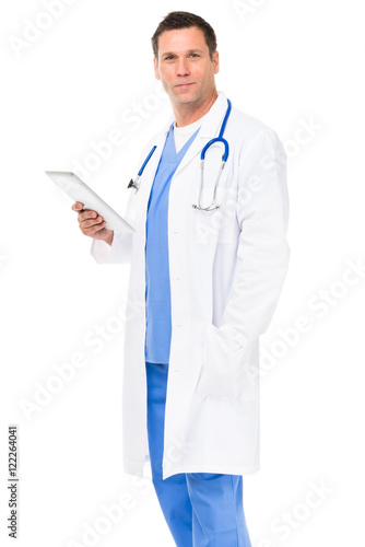 Doctor in scrubs on white