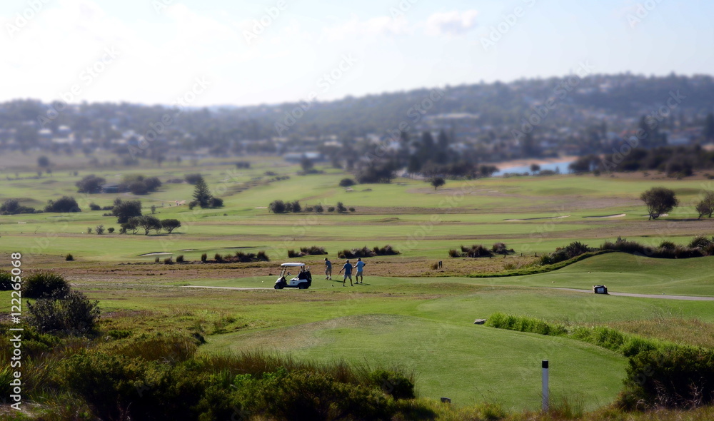 Sydney, Australia - Jan 7, 2013. Men playing golf on Long Reef Golf Course.