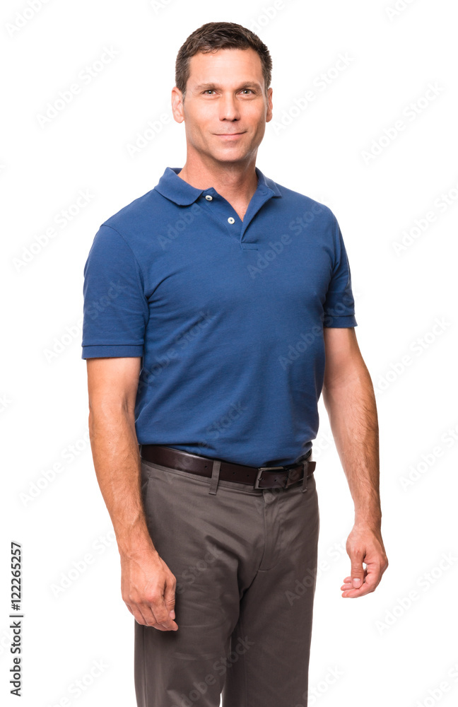 Causal dress businessman in blue polo shirt with arms at sides isolated on white background Causal dress businessman in blue polo shirt with arms at sides isolated on white background