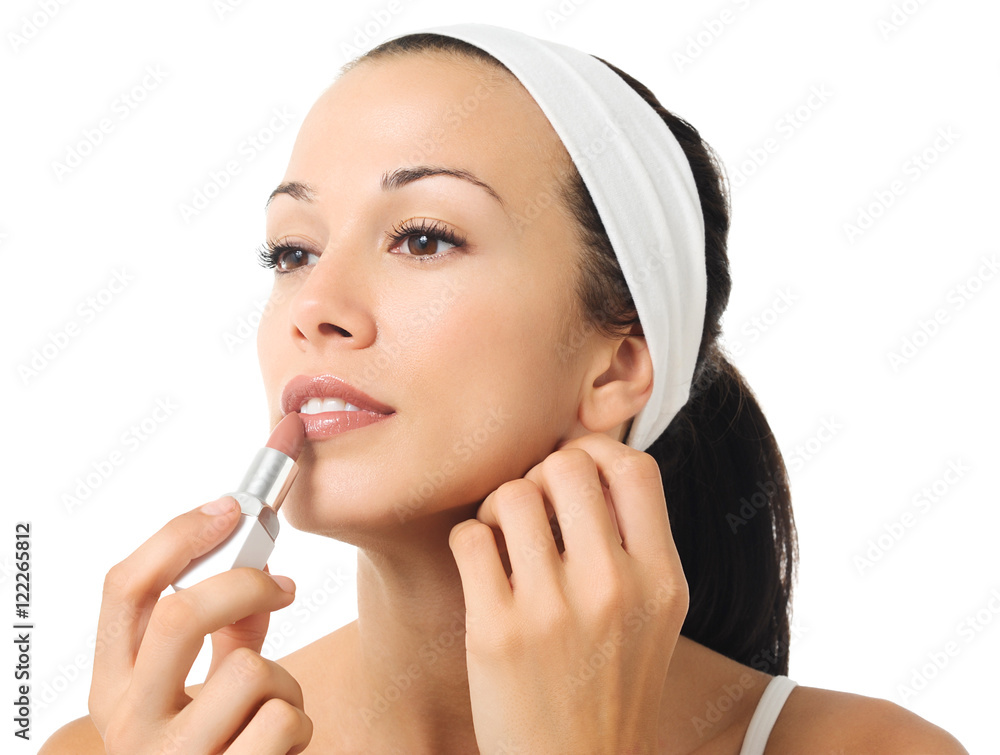 Woman Applying Lipstick Cosmetics on White Woman Applying Lipstick Cosmetics on White