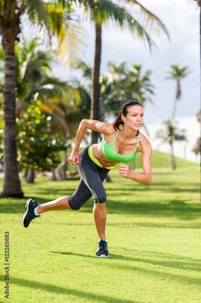 Young woman exercising in tropical park Young woman exercising in tropical park