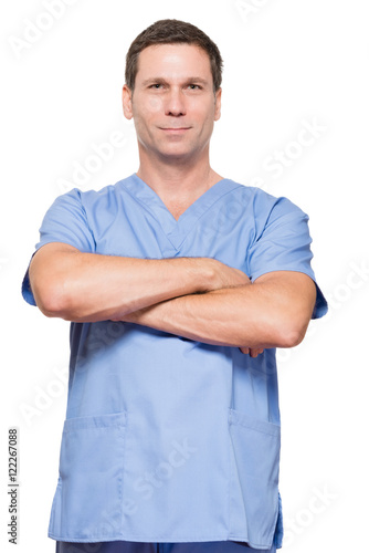 Doctor nurse surgeon with arms crossed on white