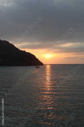 Boat on sunset