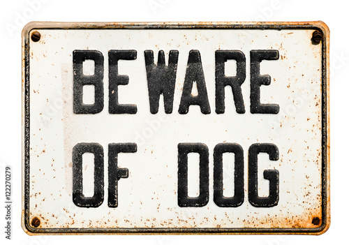Rusted metal tin Beware Of Dog sign placcard isolated on white background