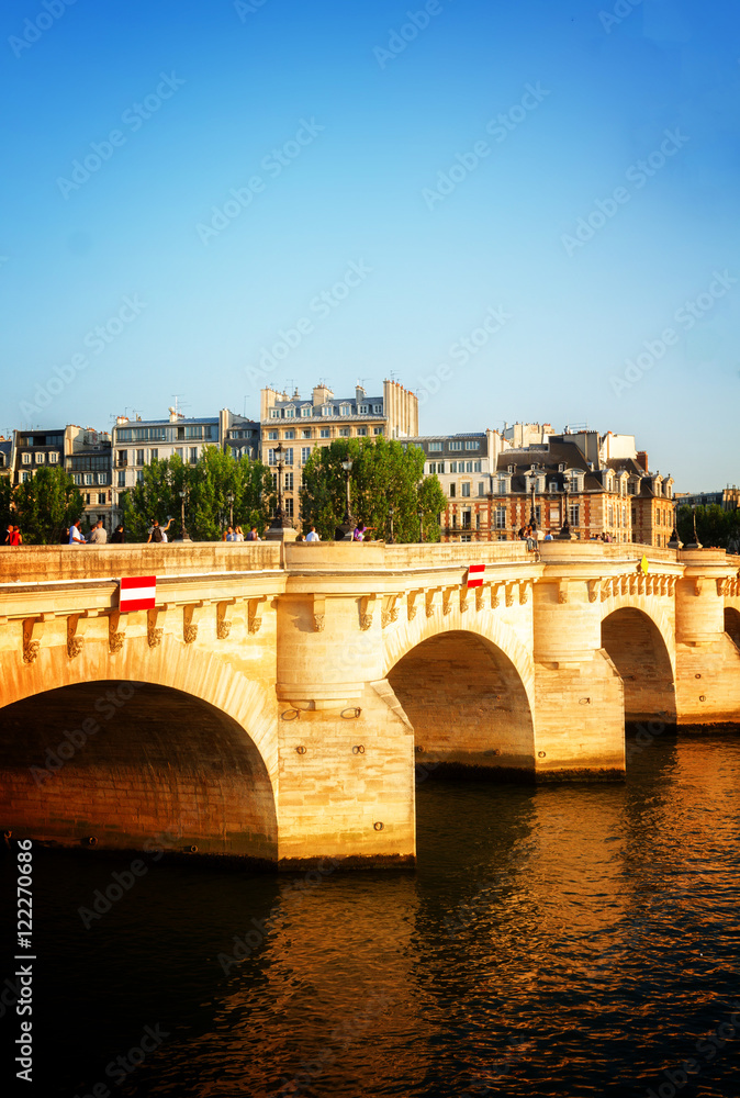 Pont Neuf and SEine river at sunny summer day, Paris, France toned Pont Neuf and SEine river at sunny summer day, Paris, France toned