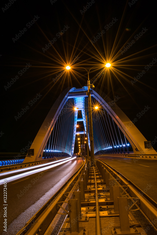 Apollo Bridge in Baratislava Slovakia at night from the middle of the highway