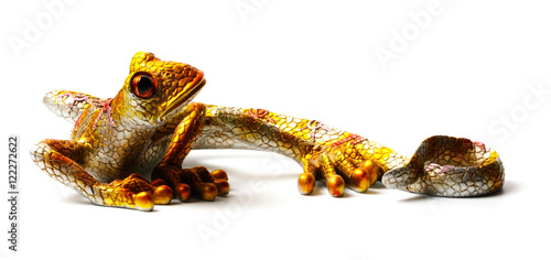 Statuette of the lizard isolated on white background