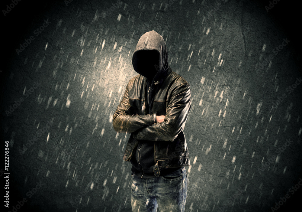 Obraz premium Unknown suspect standing in the dark