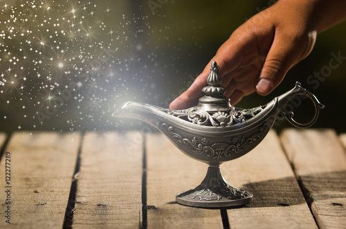 Cuadro en lienzo Beautiful antique metal lamp in true Aladin style, hand touching and animated st