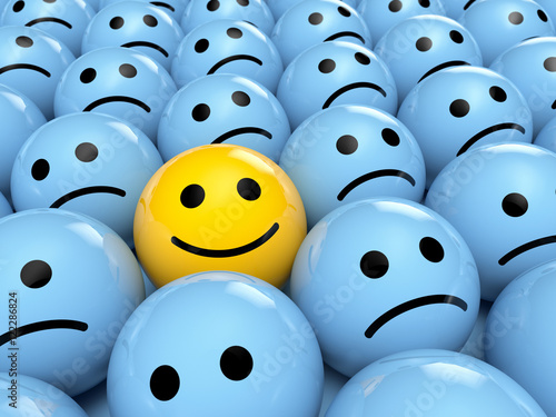 Obraz na plátně Happy Smiley Emoticon zwischen traurigen Emoticons