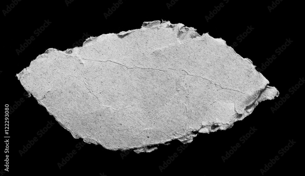 torn or ripped pieces of paper in black background torn or ripped pieces of paper in black background