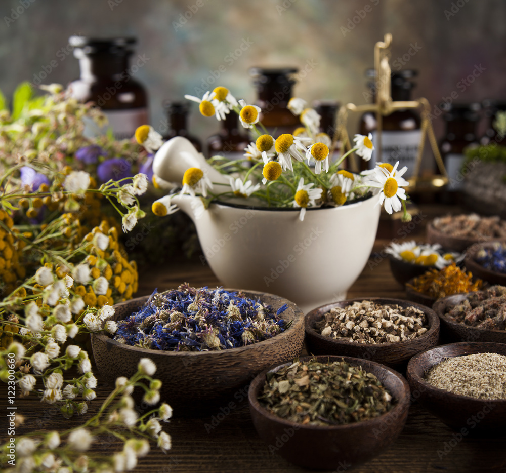 Medicine bottles and herbs background Medicine bottles and herbs background
