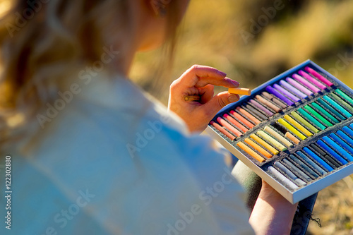 drawing set on autumn grass