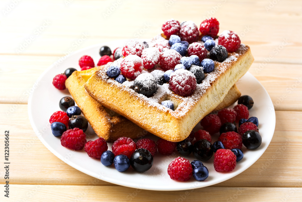 Soft waffles with blueberry and raspberry Soft waffles with blueberry and raspberry