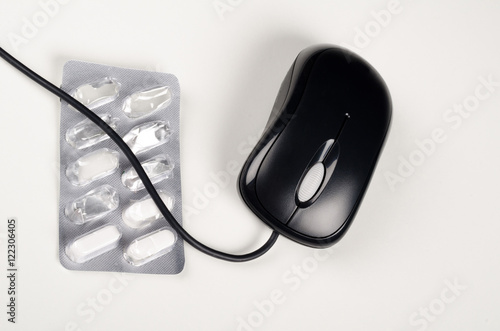 Pills and computer mouse