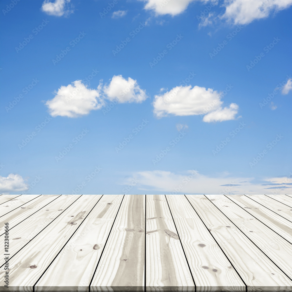 Abstract background. Wood table top on blue sky