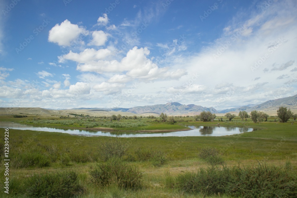  River mountains green river sky clouds