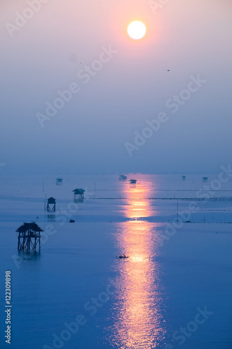 Sunrise time Thai fisherman village in Bangtaboon Petchaburi, Thailand
