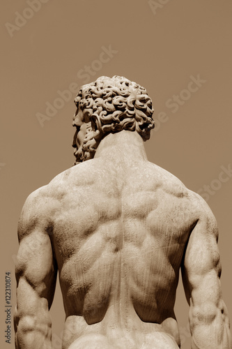 Picture of a statue of a muscular man