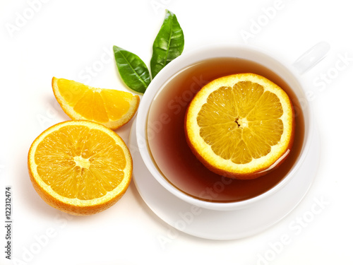 Cup of tea with orange slices