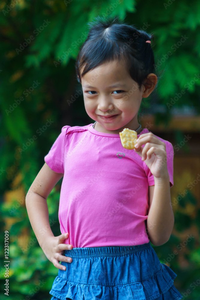 Cute Child, happy childhood, food and bakery concept - smiling l Cute Child, happy childhood, food and bakery concept - smiling l