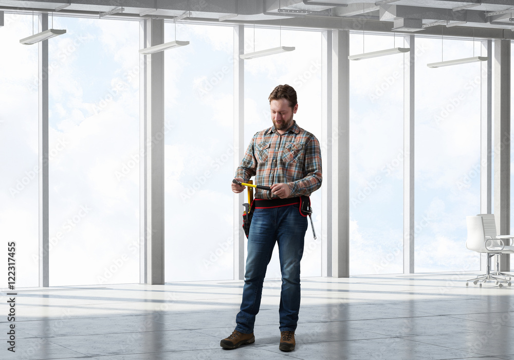 © Sergey Nivens - Adult engineer man . Mixed media