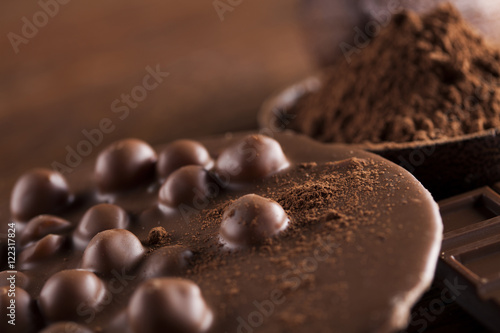 Chocolate bar, candy sweet, dessert food on wooden background