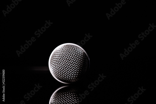 microphone isolated on black baground © Kencana Studio