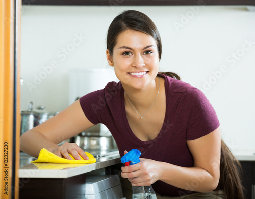 Portrait of brunette in kitchen