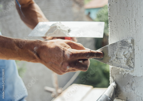 Painter working on a scaffold