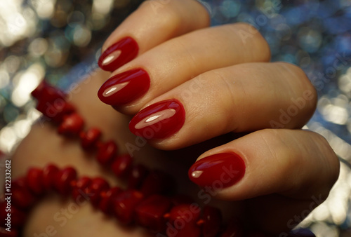 Nails, beads and beautiful clean manicure. Nails are natural. Manicure is made using nails drill machine.