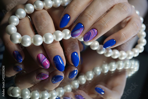 Nails, beads and beautiful clean manicure. Nails are natural. Manicure is made using nails drill machine.