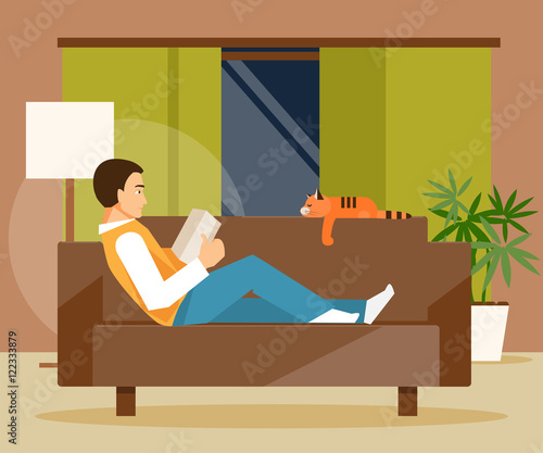 Reading man on sofa
