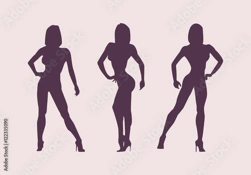 Women silhouettes athletes. Poses bodybuilders and fitnesbikini.
