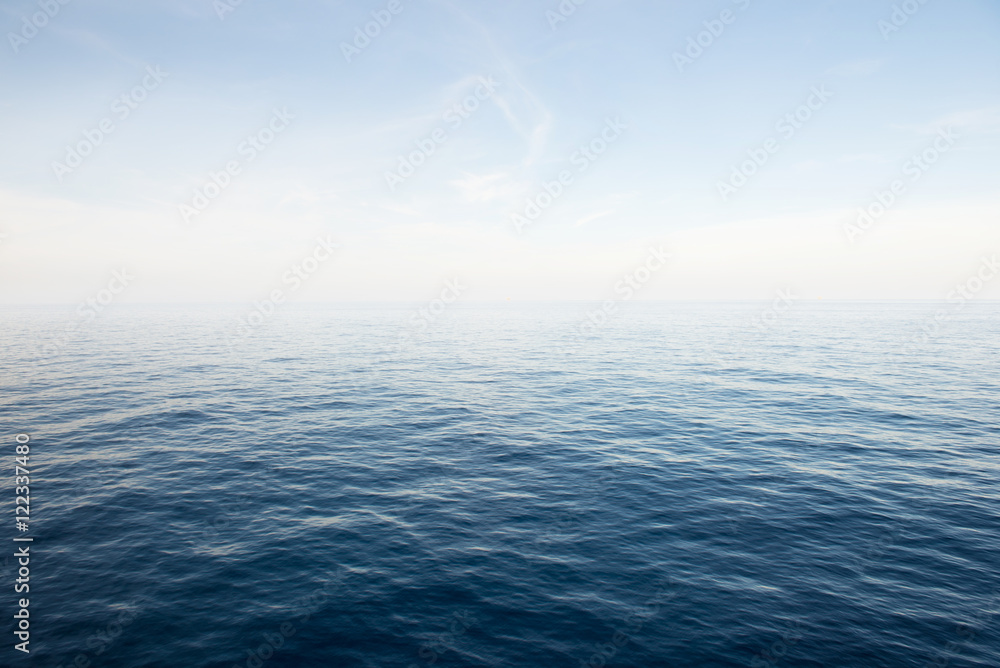 Blue sea and blue sky background.