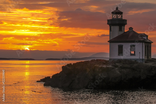 Deep Orange Sunset of a Lighthouse on the San Juan Islands in Washington State