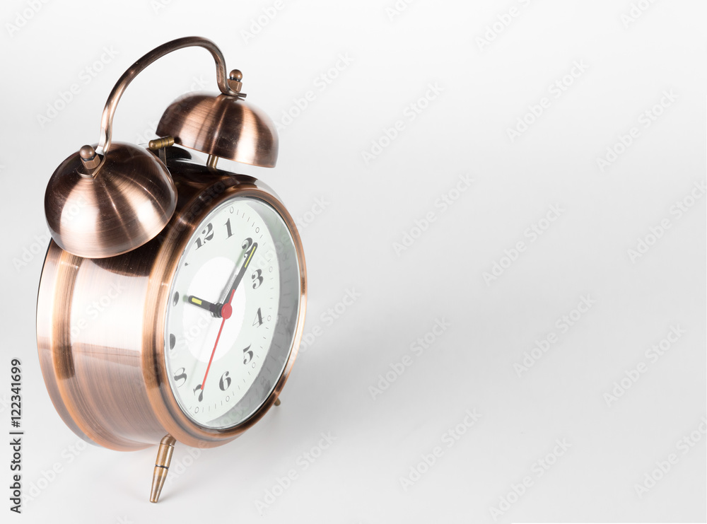 retro alarm clock isolated on white background.
retro alarm clock isolated on white background.