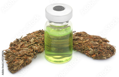 Medicinal cannabis with medicinal drug in a vial