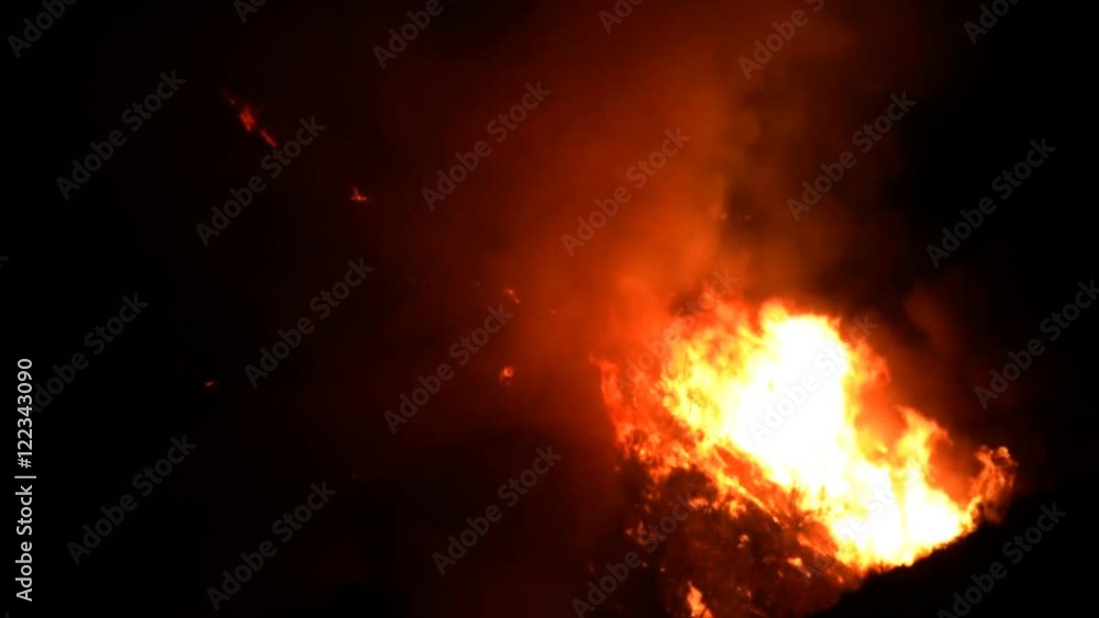 Close up view of a raging inferno in a valley. Close up view of a raging inferno in a valley.