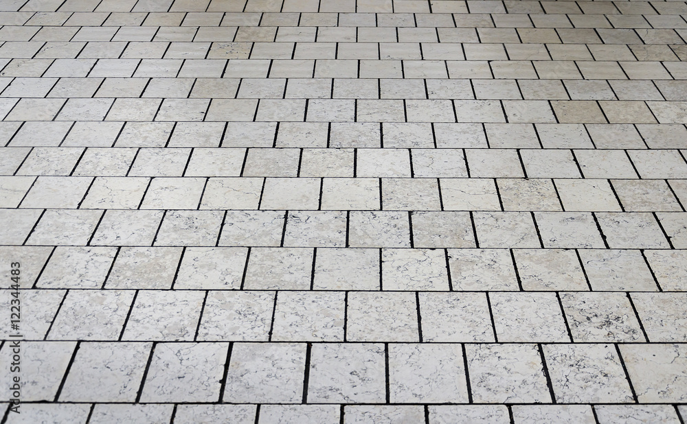 Gray stone floor tile as a texture
