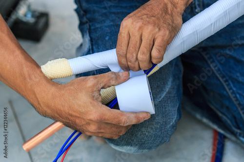 A part of preparing to install new air conditioner by a technician