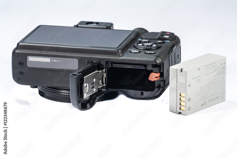 Battery box on the digital camera isolated Battery box on the digital camera isolated