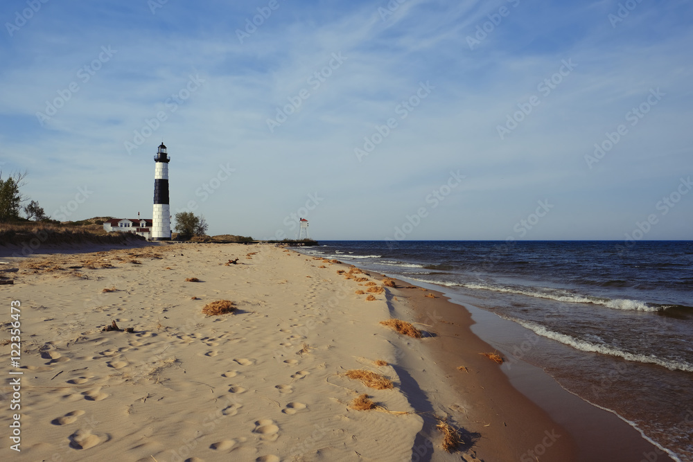 Fototapeta premium Big Sable Point Lighthouse in dunes, built in 1867