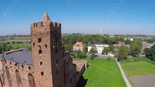 Ruins of medieval brick castle in Rydzyn Chelminski, Poland photo