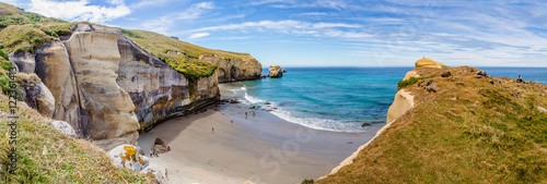 Panorama of the Tunnel beach from the coast rock photo