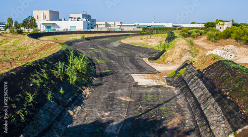 Fotografie, Tablou laying phase geomat in defense of a riverside for erosion protection